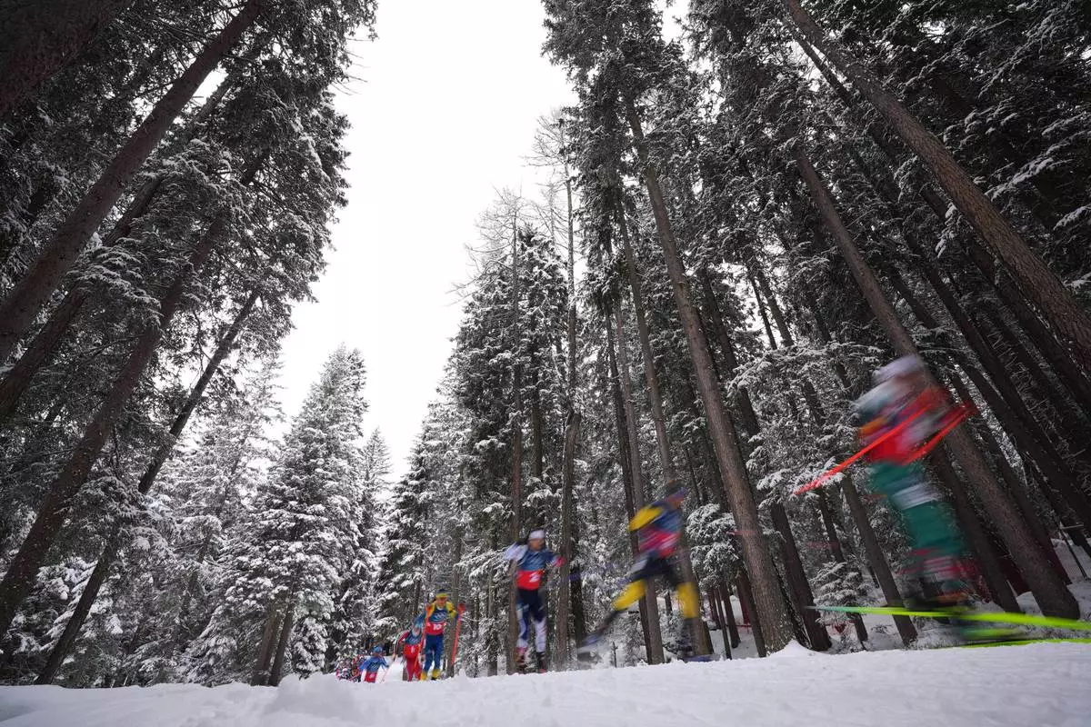 Athletes compete in the men's 4x7.5-kilometer relay biathlon race at the 2026 Winter Olympics in Anterselva, Italy, Tuesday, Feb. 17, 2026. (AP Photo/Andrew Medichini)
