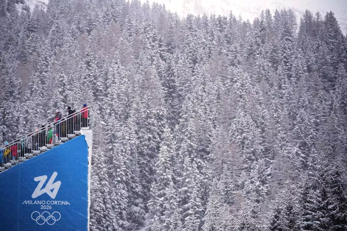 Spectators watch the men's 4x7.5-kilometer relay biathlon race at the 2026 Winter Olympics in Anterselva, Italy, Tuesday, Feb. 17, 2026. (AP Photo/Andrew Medichini)