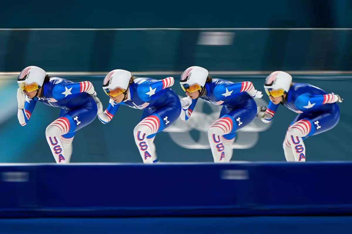 Team USA practices ahead of the semifinal of the women's team pursuit speedskating race at the 2026 Winter Olympics, in Milan, Italy, Tuesday, Feb. 17, 2026. (AP Photo/Ben Curtis)