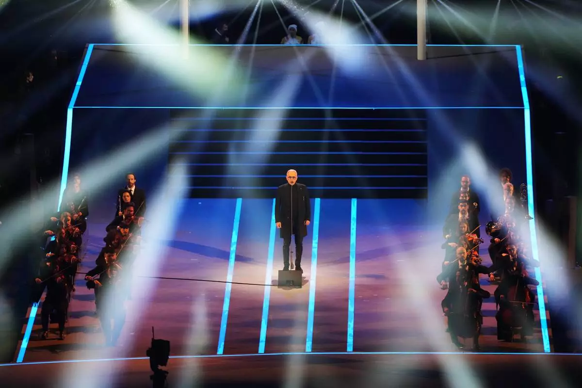 Singer Andrea Bocelli performs during the Olympic opening ceremony at the 2026 Winter Olympics, in Milan, Italy, Friday, Feb. 6, 2026. (AP Photo/Stephanie Scarbrough)