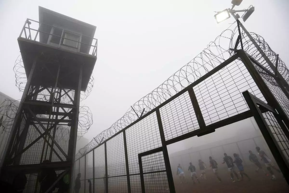 Inmates play rugby at the Valparaiso Prison Complex in Valparaiso, Chile, as part of a social reintegration program, Thursday, Jan. 29, 2026. (AP Photo/Cristobal Escobar)