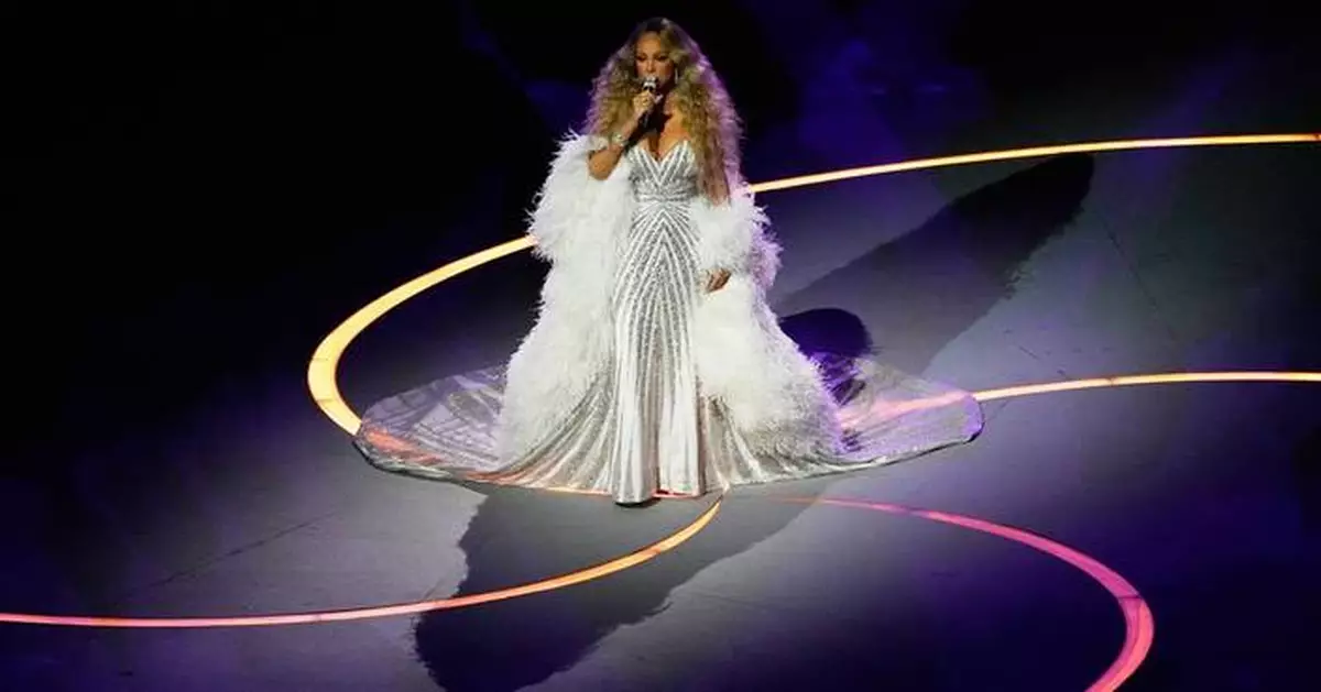 Mariah Carey's Olympic act prompts questions about possible lip-syncing and a curious teleprompter