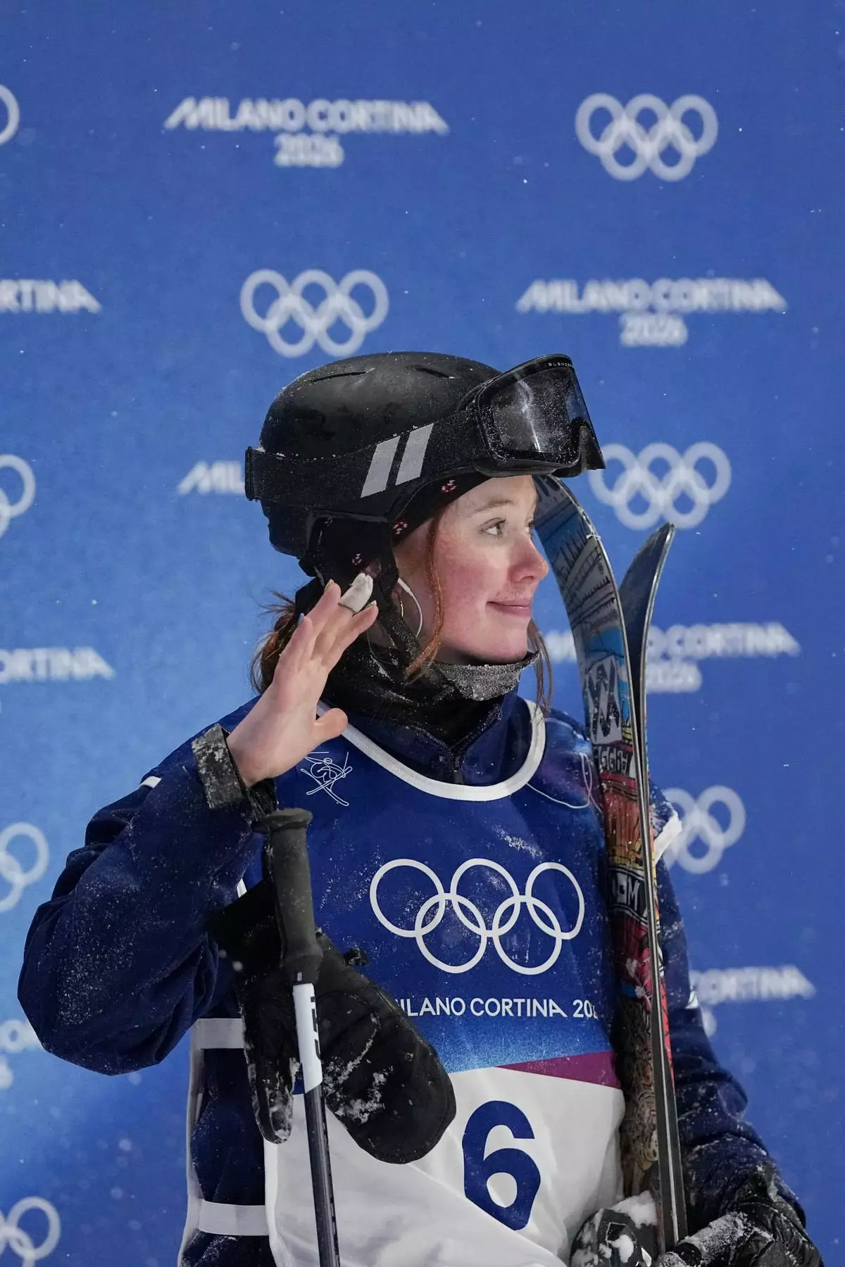 Britain's Kirsty Muir reacts after crashing during the women's freestyle skiing big air finals at the 2026 Winter Olympics, in Livigno, Italy, Monday, Feb. 16, 2026. (AP Photo/Gregory Bull)
