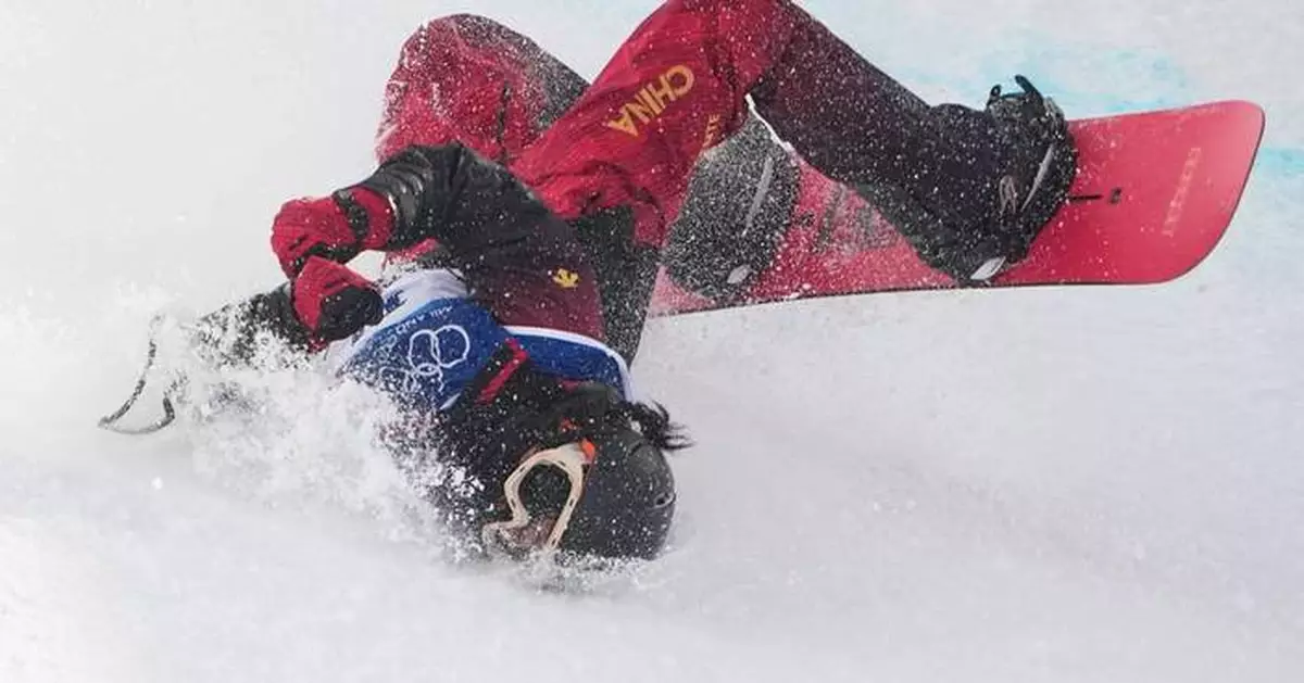 Chinese snowboarder taken off on stretcher after scary fall at Olympics