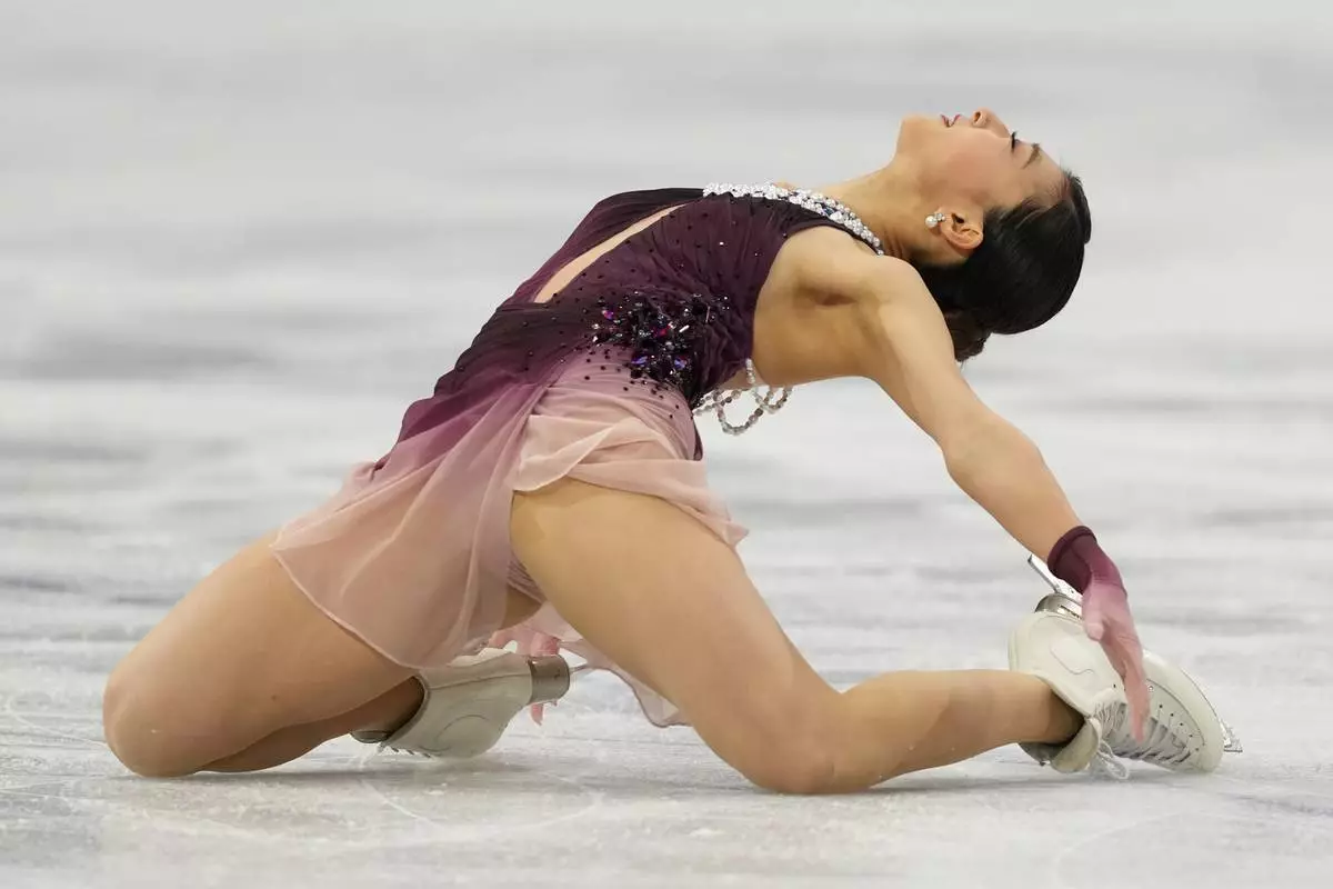 Kaori Sakamoto of Japan competes during the women's figure skating free program at the 2026 Winter Olympics, in Milan, Italy, Thursday, Feb. 19, 2026. (AP Photo/Stephanie Scarbrough)