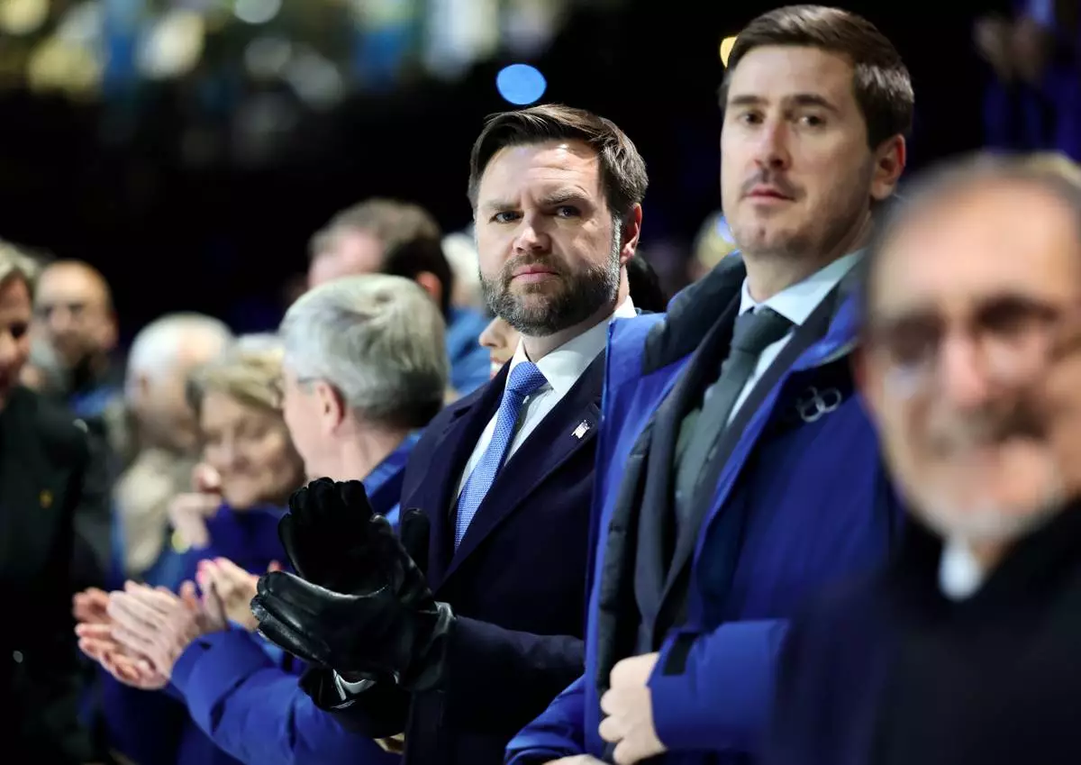 US Vice President JD Vance, center, attends the Olympic opening ceremony at the 2026 Winter Olympics, in Milan, Italy, Friday, Feb. 6, 2026. (Andreas Rentz/Pool Photo via AP)