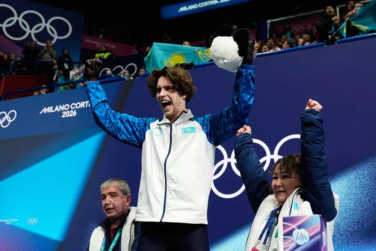 Mikhail Shaidorov of Kazakhstan competes during the men's free skate program in figure skating at the 2026 Winter Olympics, in Milan, Italy, Friday, Feb. 13, 2026. (AP Photo/Ashley Landis)