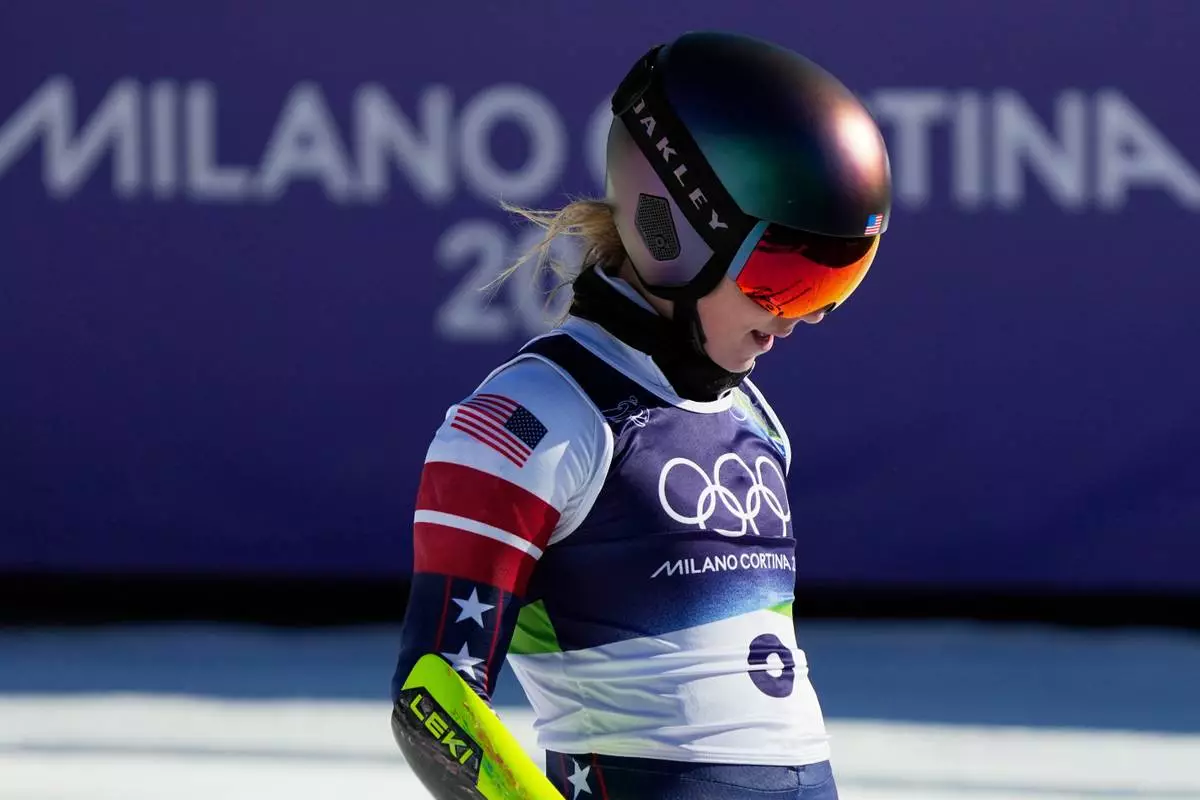 United States' Mikaela Shiffrin at the finish area of an alpine ski, women's giant slalom race, at the 2026 Winter Olympics, in Cortina d'Ampezzo, Italy, Sunday, Feb. 15, 2026. (AP Photo/Andy Wong)