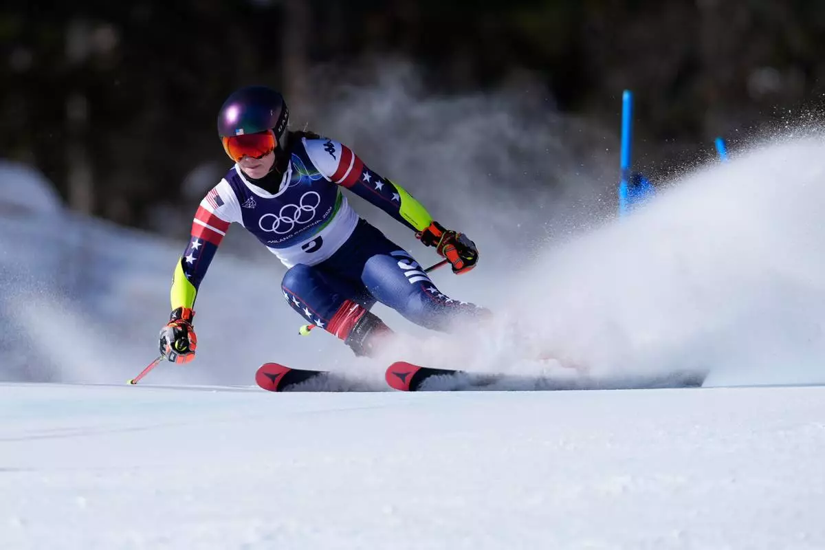 United States' Mikaela Shiffrin speeds down the course, during an alpine ski, women's giant slalom race, at the 2026 Winter Olympics, in Cortina d'Ampezzo, Italy, Sunday, Feb. 15, 2026. (AP Photo/Robert F. Bukaty)