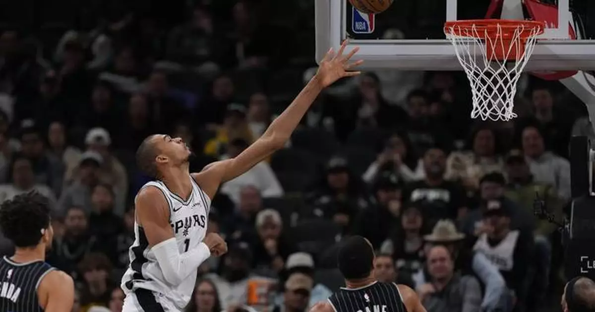 Wembanyama fuels early surge in late start as Spurs overcome travel woes to beat Magic