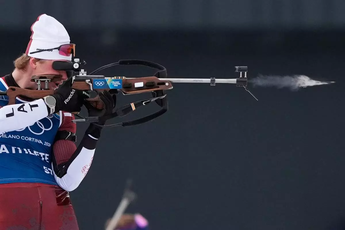 Renars Birkentals, of Latvia, participates in a biathlon training session at the 2026 Winter Olympics in Anterselva, Italy, Saturday, Feb. 7, 2026. (AP Photo/Mosa'ab Elshamy)