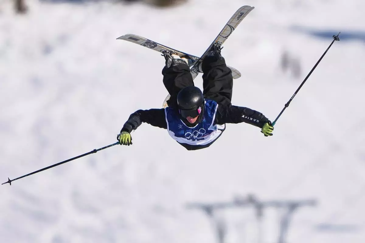 New Zealand's Lucas Ball competes during men's freestyle skiing slopestyle qualifications at the 2026 Winter Olympics, in Livigno, Italy, Saturday, Feb. 7, 2026. (AP Photo/Lindsey Wasson)