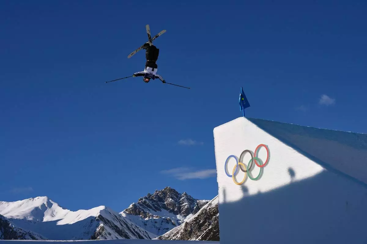 New Zealand's Lucas Ball competes during men's freestyle skiing slopestyle qualifications at the 2026 Winter Olympics, in Livigno, Italy, Saturday, Feb. 7, 2026. (AP Photo/Gregory Bull)