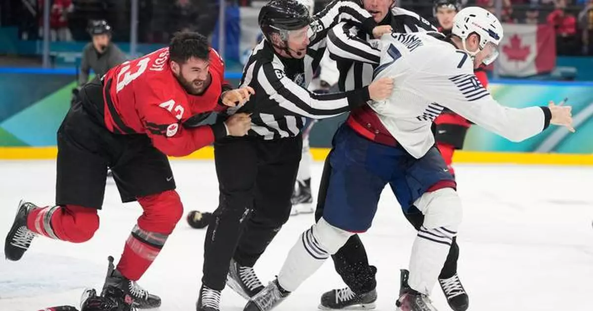 Tom Wilson fights in Canada's game vs. France at the Olympics