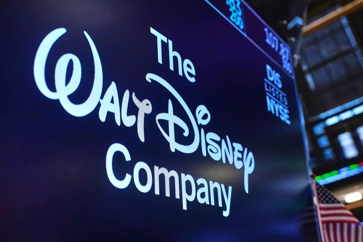 The logo for The Walt Disney Company is displayed above a trading post on the floor of the New York Stock Exchange, Monday, Feb. 2, 2026. (AP Photo/Richard Drew)