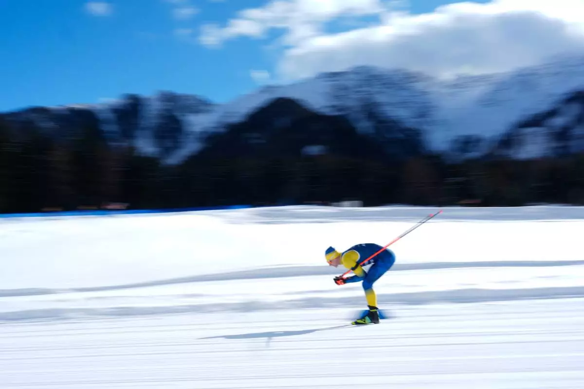 Dmytro Pidruchnyi, of Ukraine, skis during a biathlon training session at the 2026 Winter Olympics in Anterselva, Italy, Monday, Feb. 9, 2026. (AP Photo/Mosa'ab Elshamy)
