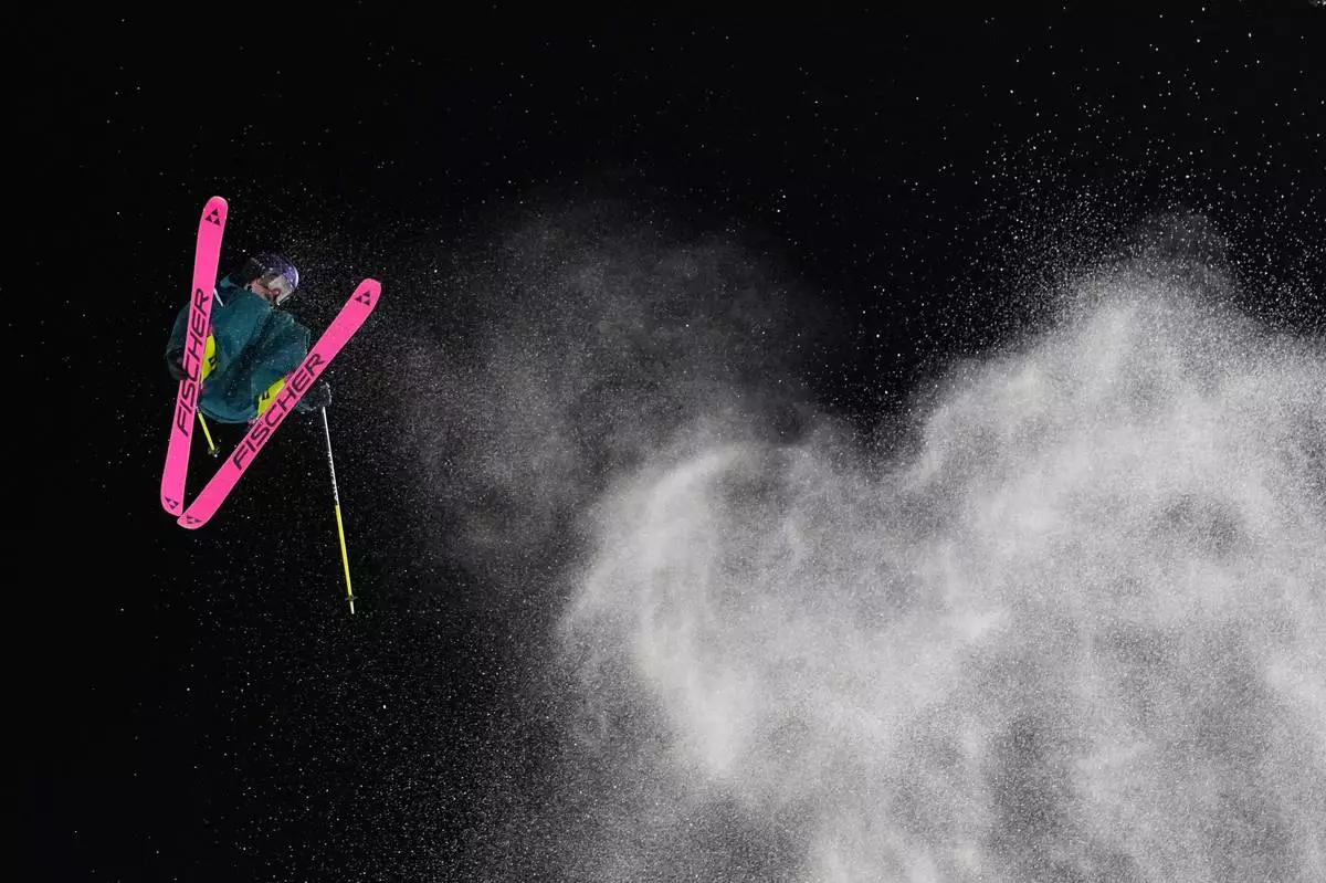 Switzerland's Mathilde Gremaud competes in the women's freestyle skiing big air qualifications at the 2026 Winter Olympics, in Livigno, Italy, Saturday, Feb. 14, 2026. (AP Photo/Lindsey Wasson)