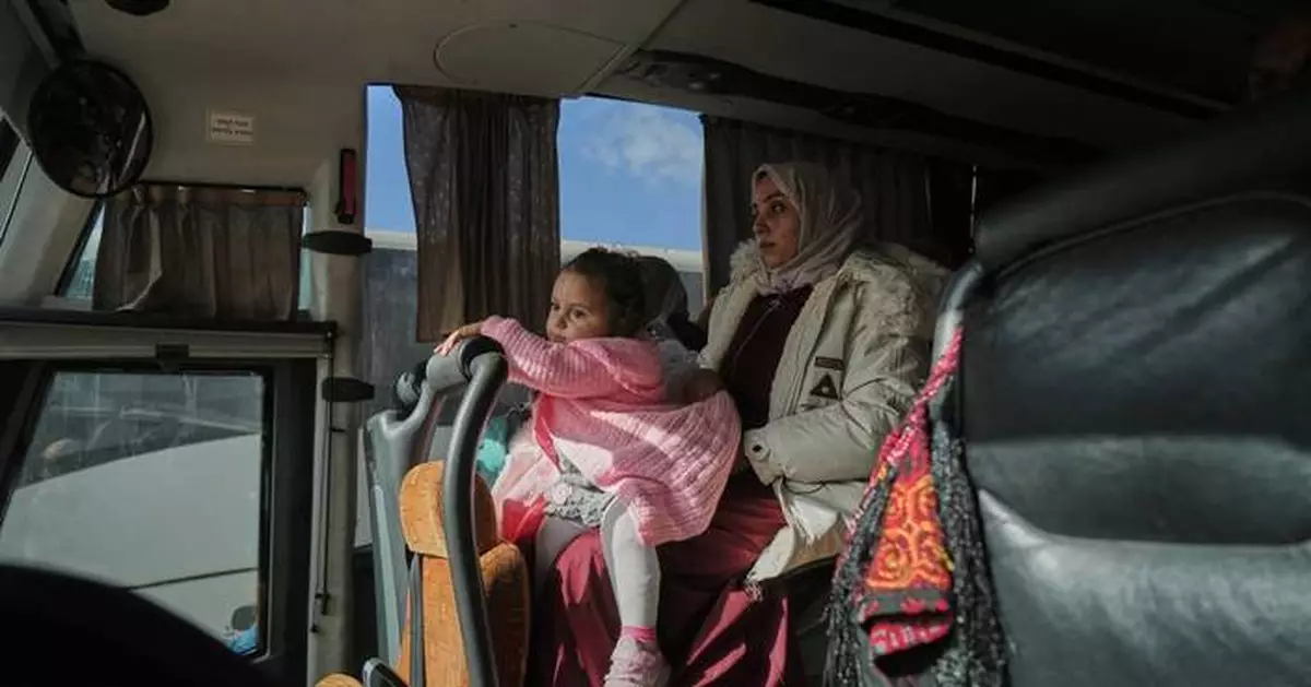 Palestinians wait at border between Gaza and Egypt as uncertainty clouds reopening of Rafah crossing