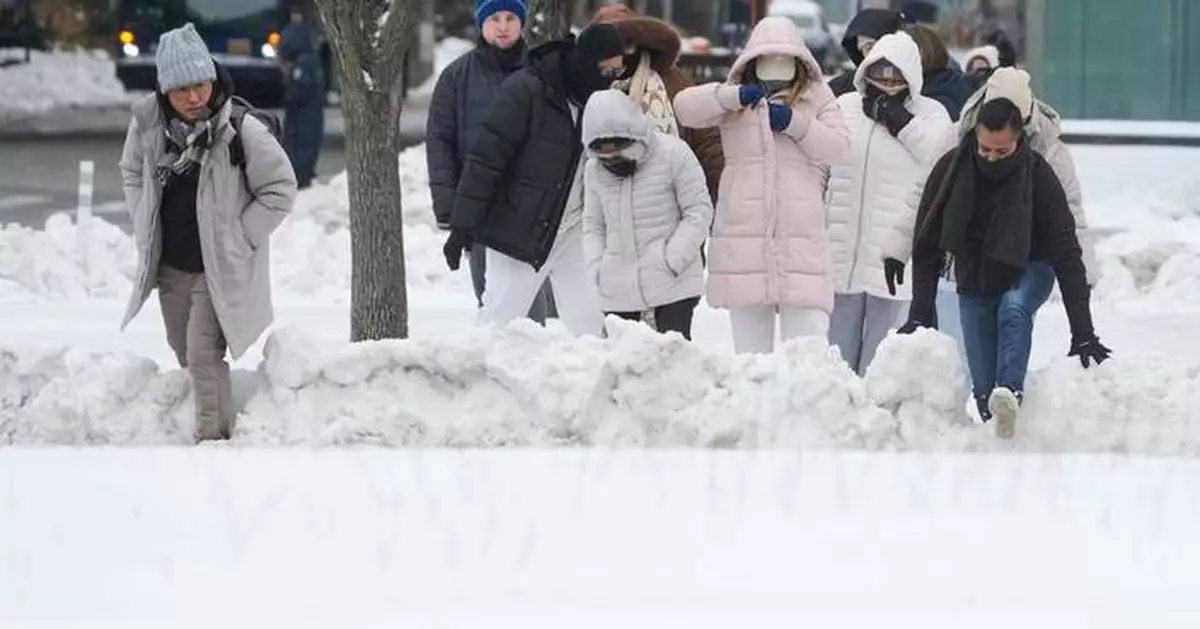 Blizzard warnings send East Coast scrambling to prepare for heavy snow and strong winds