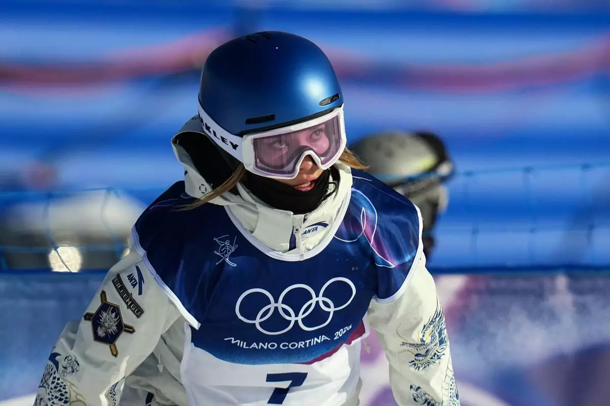 China's Eileen Gu looks on during women's freestyle skiing slopestyle qualifications at the 2026 Winter Olympics, in Livigno, Italy, Saturday, Feb. 7, 2026. (AP Photo/Gregory Bull)