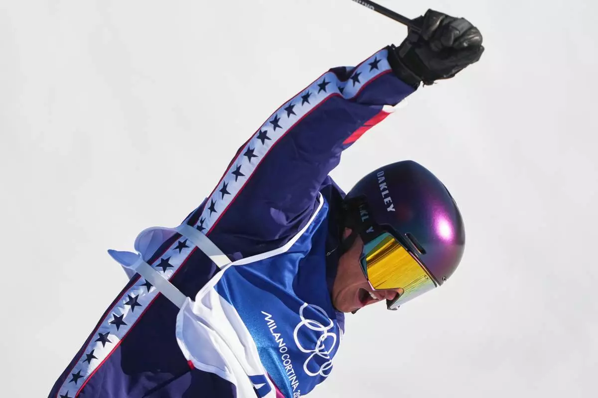 United States' Mac Forehand celebrates during men's freestyle skiing slopestyle qualifications at the 2026 Winter Olympics, in Livigno, Italy, Saturday, Feb. 7, 2026. (AP Photo/Lindsey Wasson)