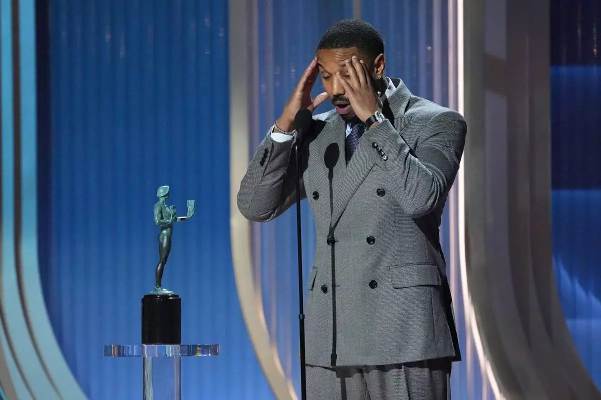 Michael B. Jordan accepts the award for outstanding performance by a male actor in a leading role for "Sinners" during the 32nd Annual Actor Awards on Sunday, March 1, 2026, at the Shrine Auditorium and Expo Hall in Los Angeles. (AP Photo/Chris Pizzello)