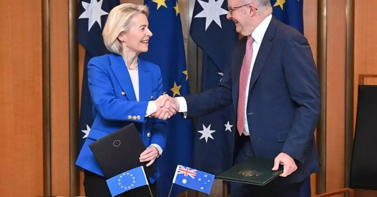 EU and Australia sign free trade pact and announce a new defense partnership