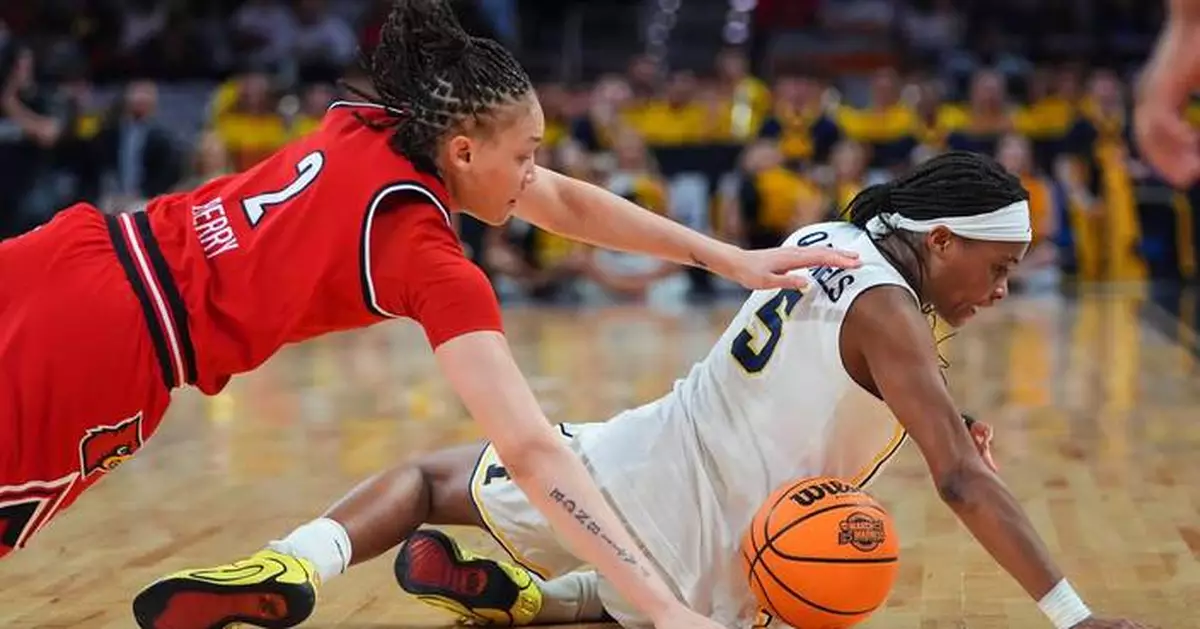 Olivia Olson and Syla Swords lead Michigan over Louisville 71-52 in Sweet 16 of March Madness