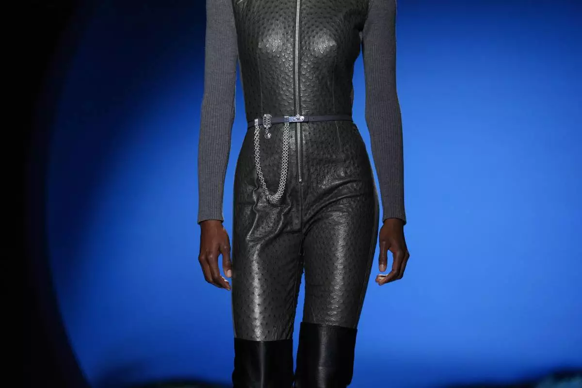 A model wears a creation as part of the Hermes Fall/Winter 2026-2027 Women's collection presented in Paris, Saturday, March 7, 2026. (AP Photo/Aurelien Morissard)