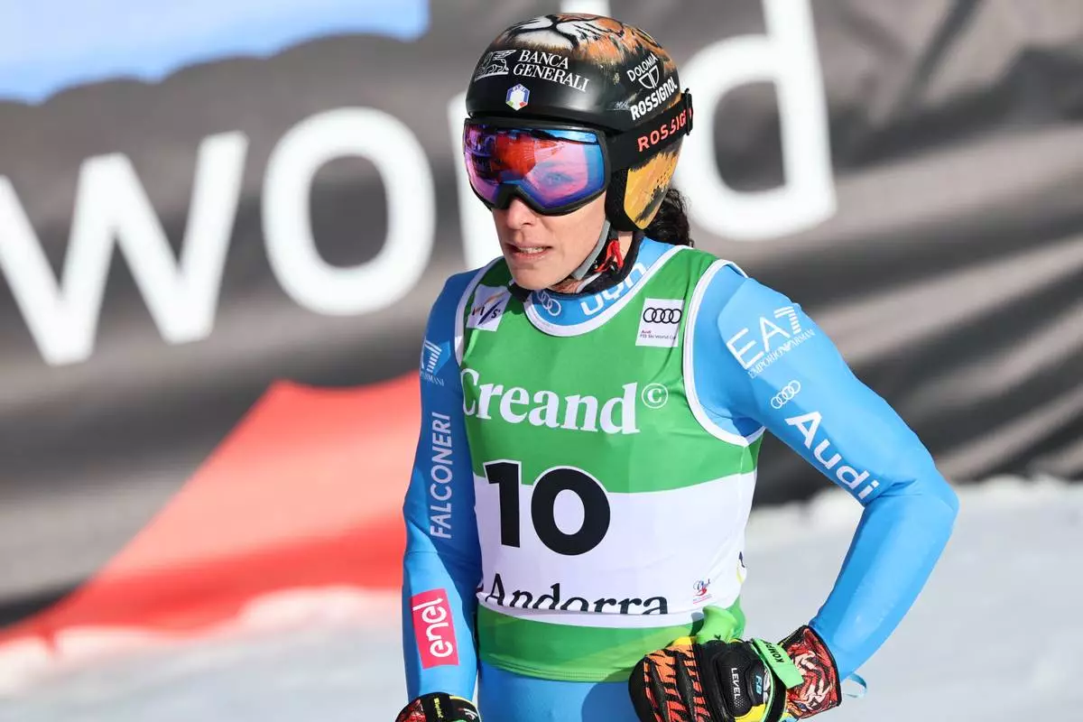 Italy's Federica Brignone reacts at the finish area during a women's World Cup super-G race, in Soldeu, Andorra, Saturday, Feb. 28, 2026. (AP Photo/Marco Trovati)