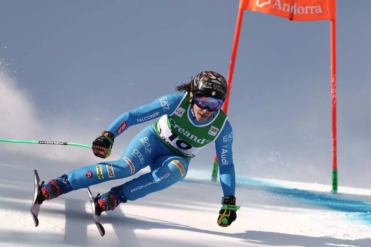 Italy's Federica Brignone speeds down the course during a women's World Cup super-G race, in Soldeu, Andorra, Saturday, Feb. 28, 2026. (AP Photo/Gabriele Facciotti)