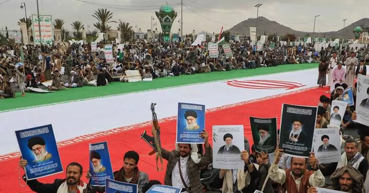 As other Iran‑allied groups are engaging in the Mideast war, Yemen's Houthis hold back