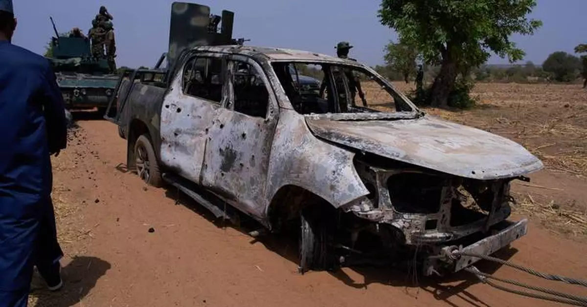 Militants in northern Nigeria kill 10 security forces and 1 resident, officials say