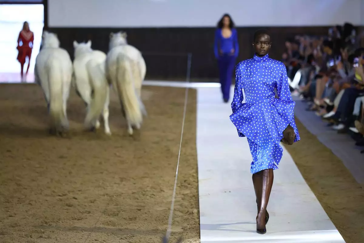 A model wears a creation from the Stella McCartney Fall/Winter 2026-2027 Women's collection presented in Paris, Wednesday, March 4, 2026. (AP Photo/Tom Nicholson)