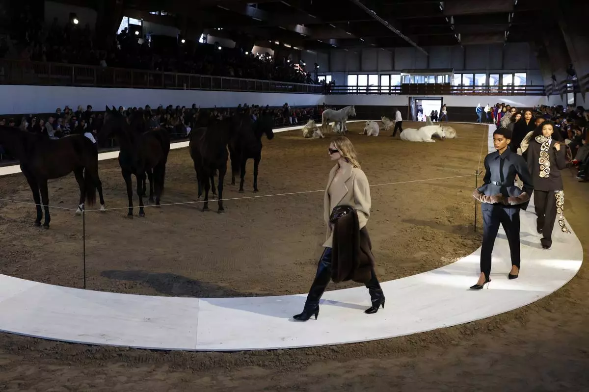 Models wear creations from the Stella McCartney Fall/Winter 2026-2027 Women's collection presented in Paris, Wednesday, March 4, 2026. (AP Photo/Tom Nicholson)