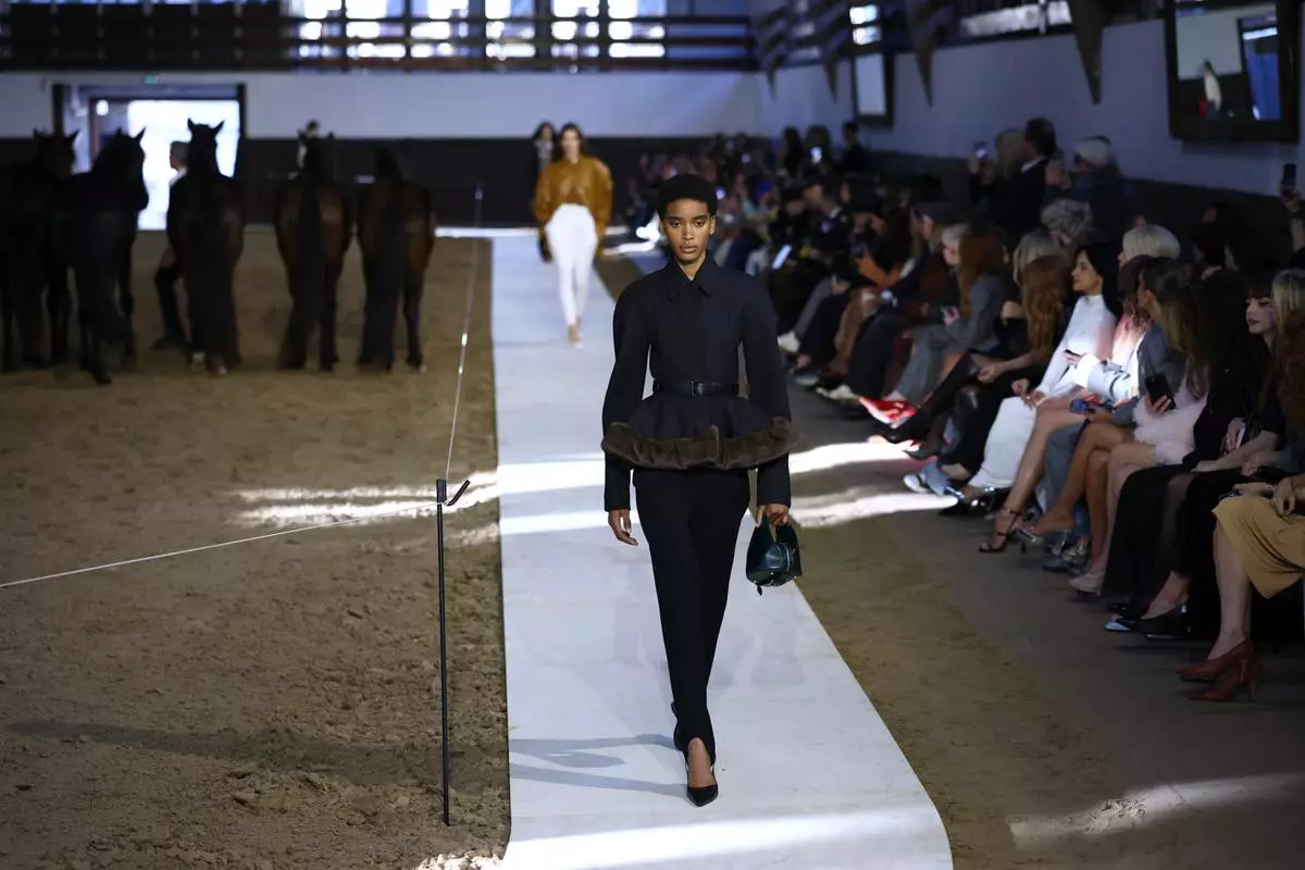 A model wears a creation from the Stella McCartney Fall/Winter 2026-2027 Women's collection presented in Paris, Wednesday, March 4, 2026. (AP Photo/Tom Nicholson)