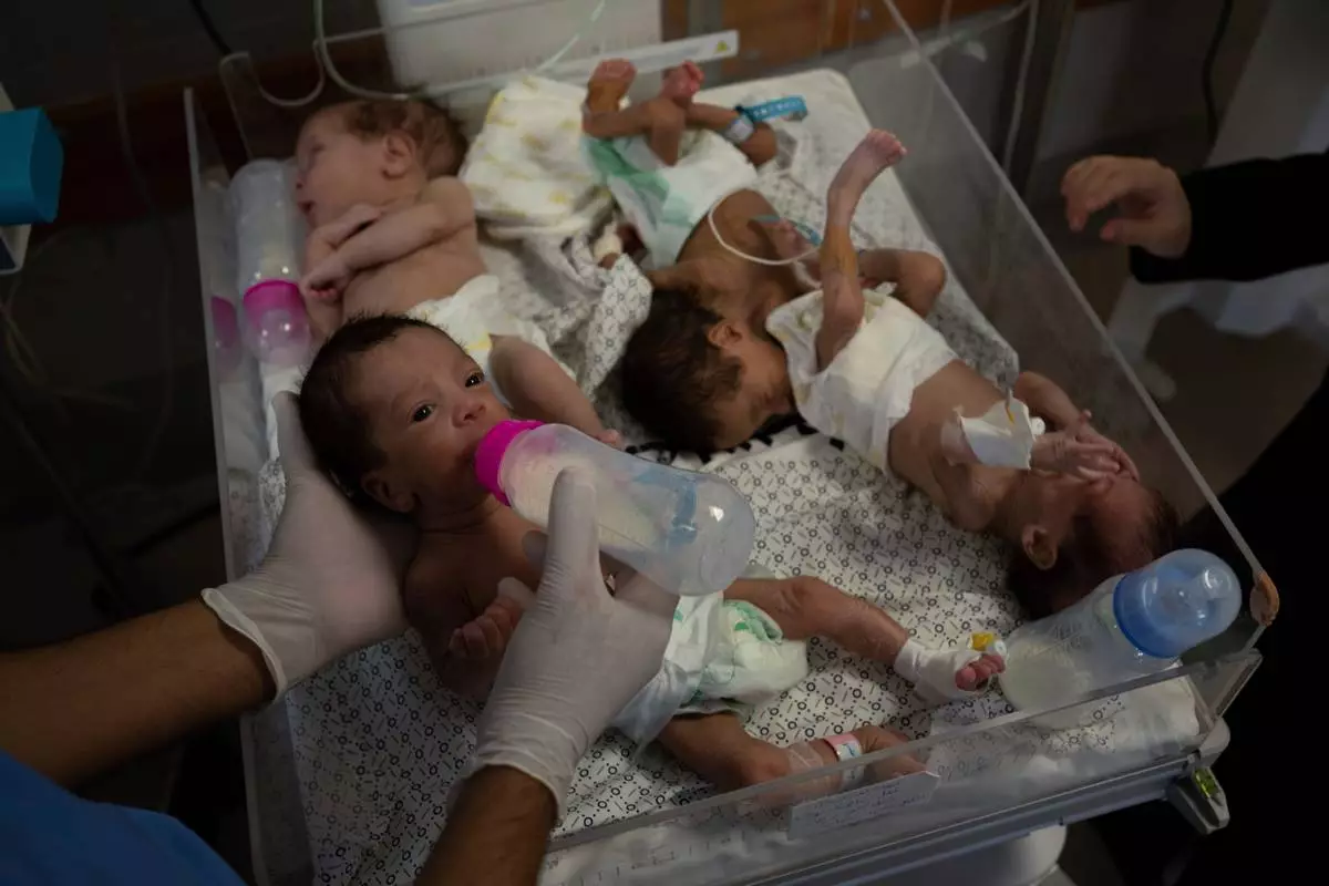 FILE - Medics prepare premature babies for transport to Egypt after they were evacuated from Shifa Hospital in Gaza City to a hospital in Rafah, Gaza Strip, Monday, Nov. 20, 2023. (AP Photo/Fatima Shbair, File)
