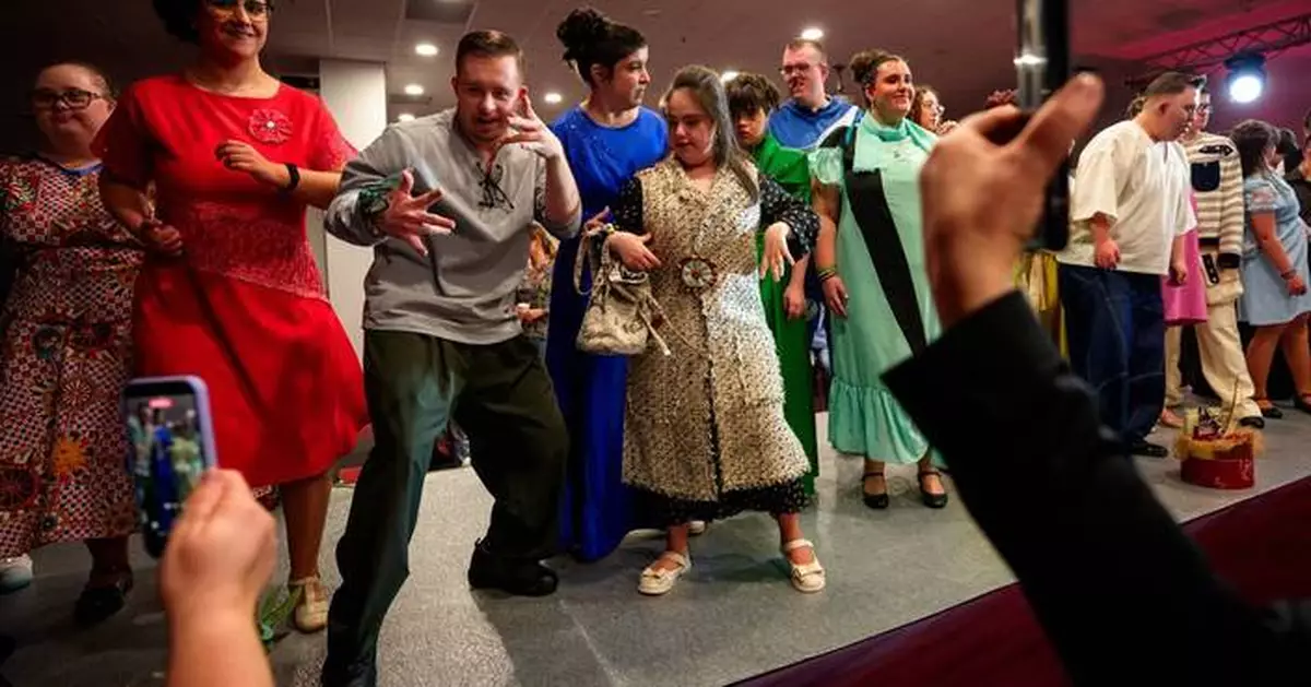 Models with Down syndrome in Romania strike a pose for World Down Syndrome Day