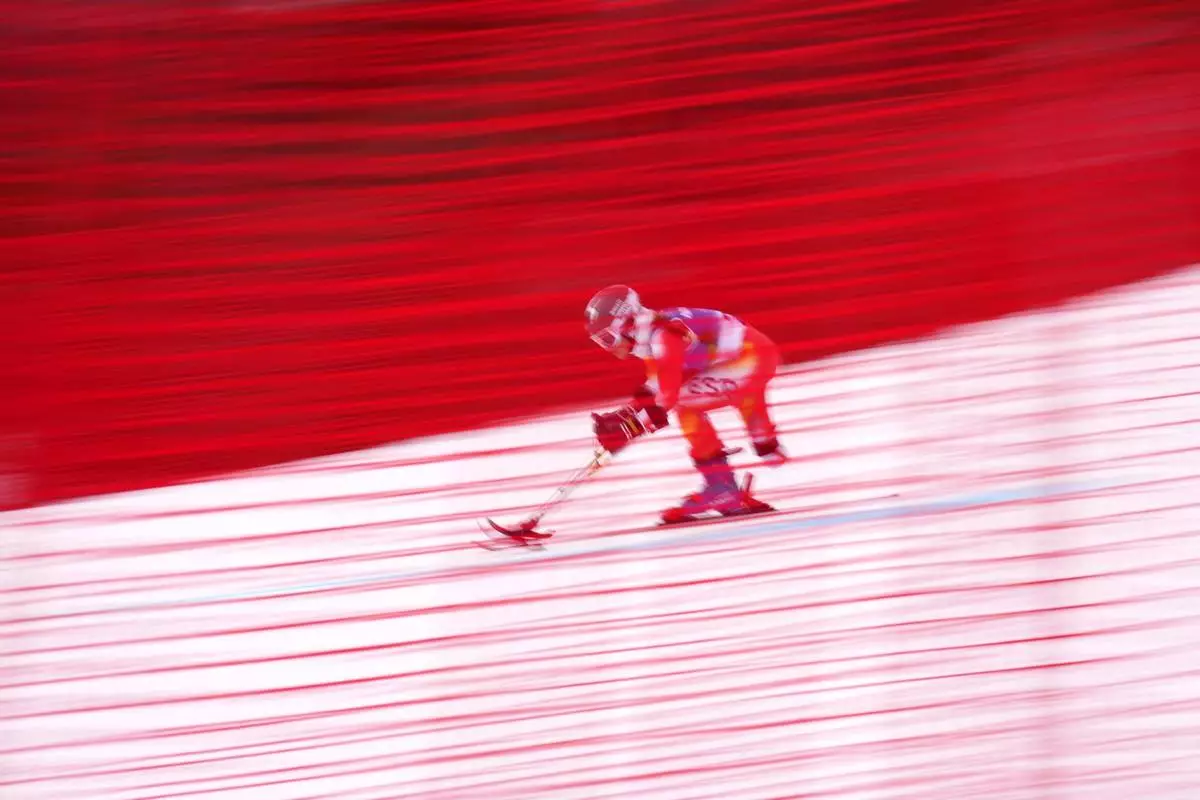 Maria Martin-Granizo, of Spain, competes in her first run of the alpine skiing women's giant slalom standing at the 2026 Winter Paralympics, in Cortina d'Ampezzo, Italy, Thursday, March 12, 2026. (AP Photo/Emilio Morenatti)