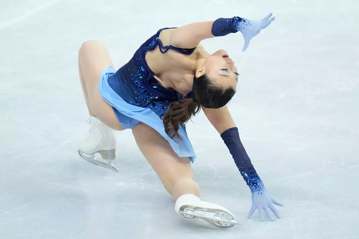 Kaori Sakamoto from Japan skates during the women¥s short program at the Figure Skating World Championships in Prague, Czech Republic, Wednesday, March 25, 2026. (AP Photo/Petr David Josek)