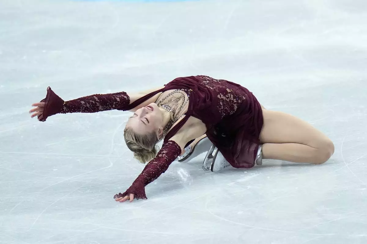 Amber Glenn from the United States skates during the women¥s short program at the Figure Skating World Championships in Prague, Czech Republic, Wednesday, March 25, 2026. (AP Photo/Petr David Josek)