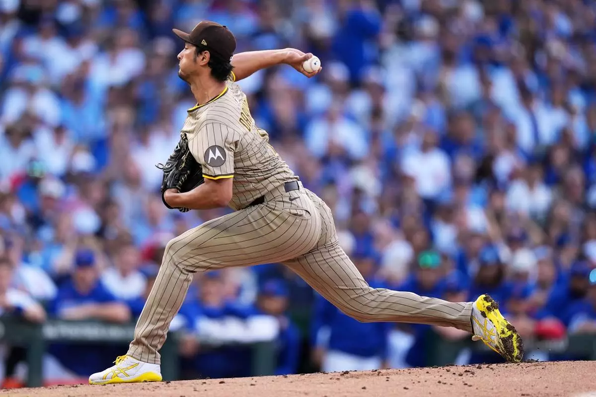 FILE - San Diego Padres' Yu Darvish throws during the first inning of Game 3 of a National League wild card baseball game against the Chicago Cubs, Oct. 2, 2025, in Chicago. (AP Photo/Nam Huh, File)