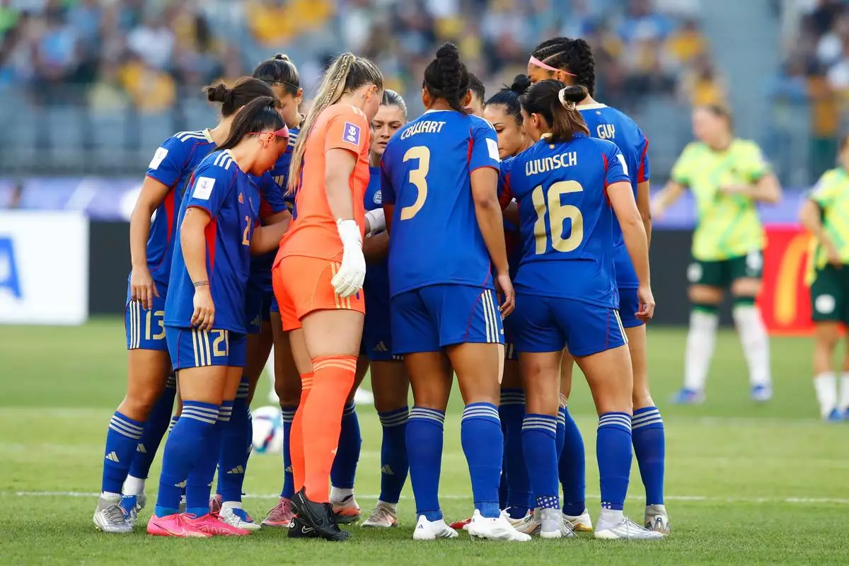 Philippines players react ahead of the second half of the Women's Asia Cup soccer match between Australia and the Philippines in Perth, Australia, Sunday, March 1, 2026. (AP Photo/Gary Day)