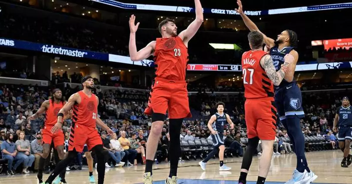 Holiday and Grant power the Trail Blazers to a 122-114 win over the Grizzlies