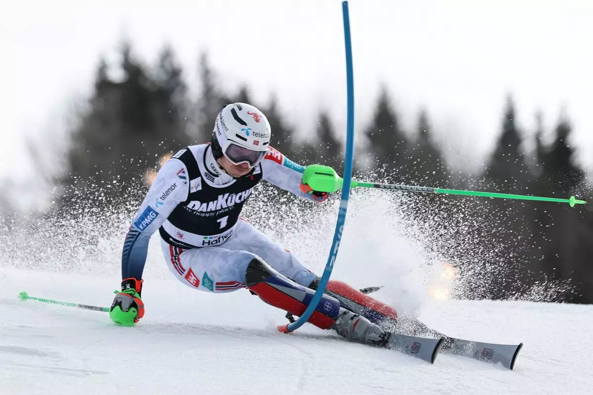 Norway's Henrik Kristoffersen competes in an alpine ski, men's slalom race, at the Lillehammer World Cup Finals, in Hafjell, Norway, Wednesday, March 25, 2026. (AP Photo/Marco Trovati)