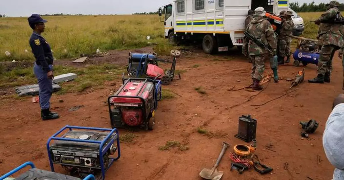 South African soldiers dismantle illegal mining operations near Johannesburg as miners flee