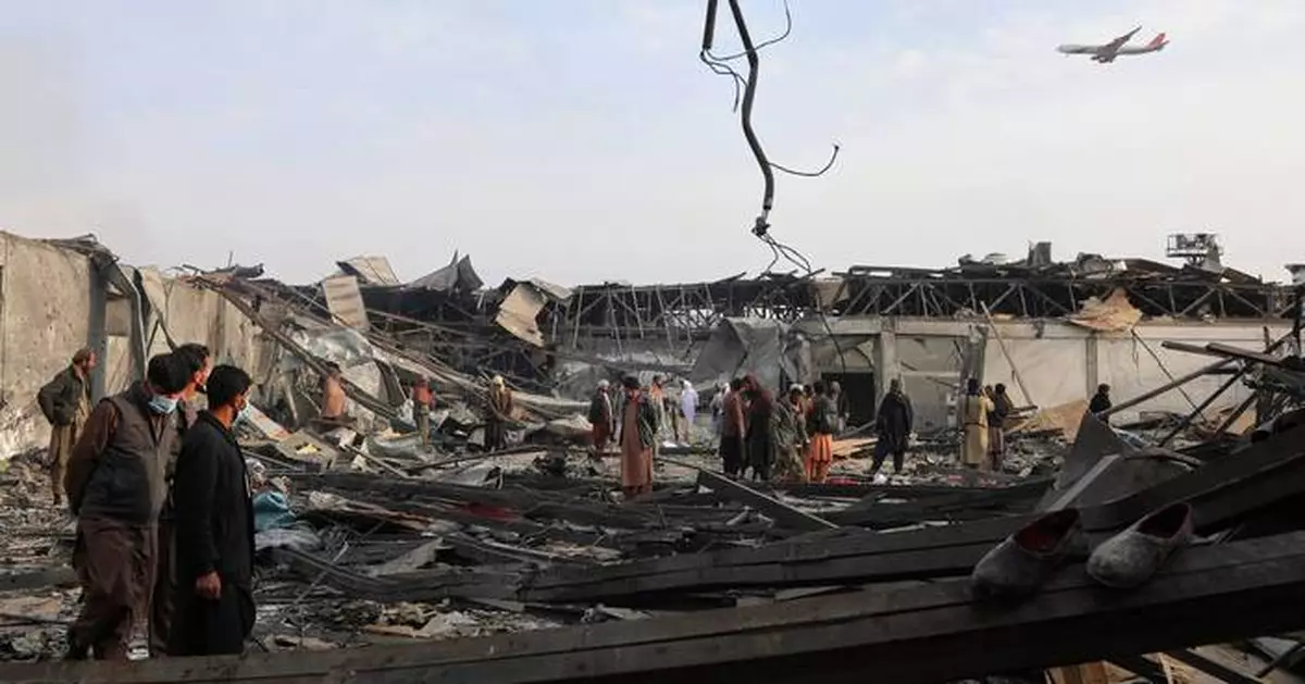 Rescue crews dig bodies out of the ruins of a Kabul hospital hit in an airstrike blamed on Pakistan