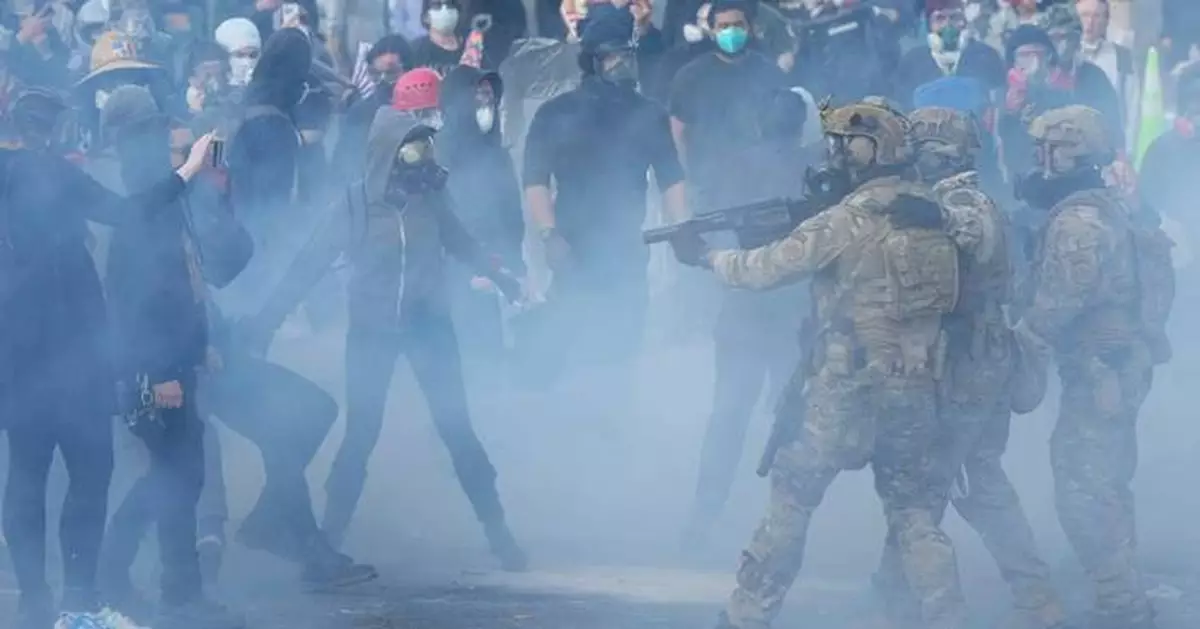 Judge in Oregon limits federal officers' tear gas use at Portland ICE building protests