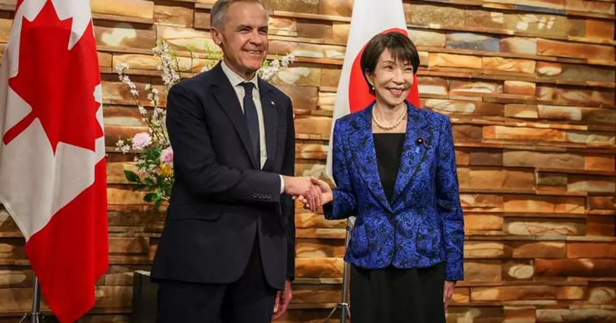 Japan, Canada sign strategic agreement in defense and energy as war in Mideast fuels oil concerns