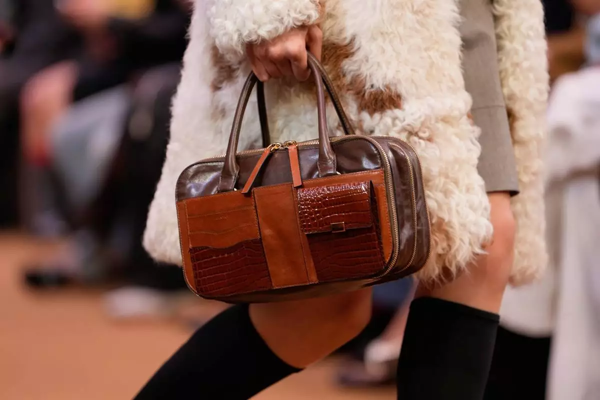 A model wears a creation from the Marni Fall/Winter 2026-2027 Women's collection presented in Milan, Italy, Thursday, Feb. 26, 2026. (AP Photo/Luca Bruno)